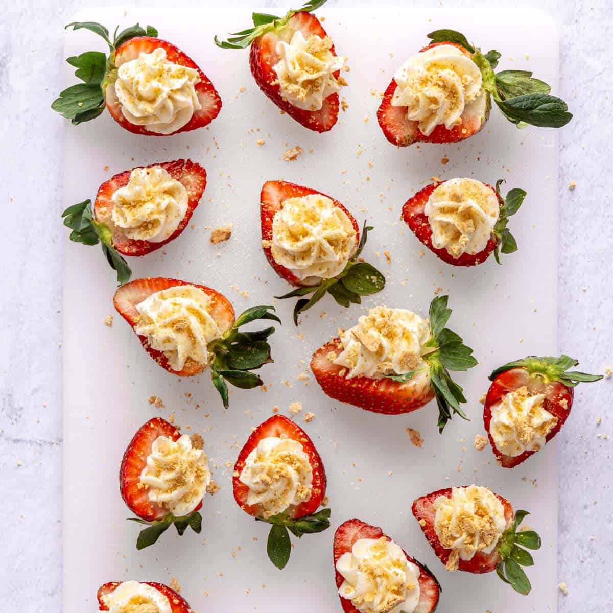 Crushed graham crackers sprinkled on top of deviled strawberries.