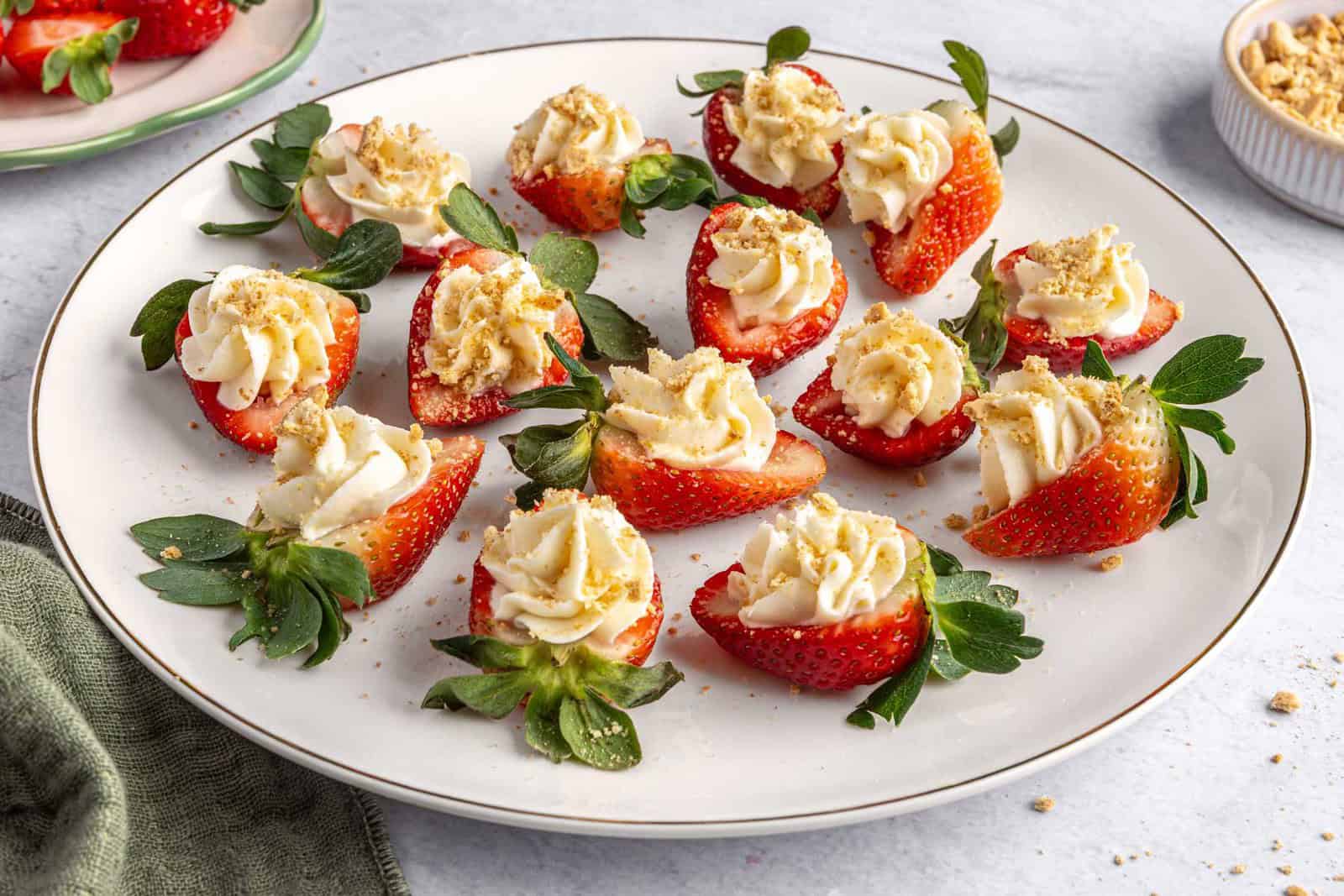Cheesecake deviled strawberries recipe on a serving plate.