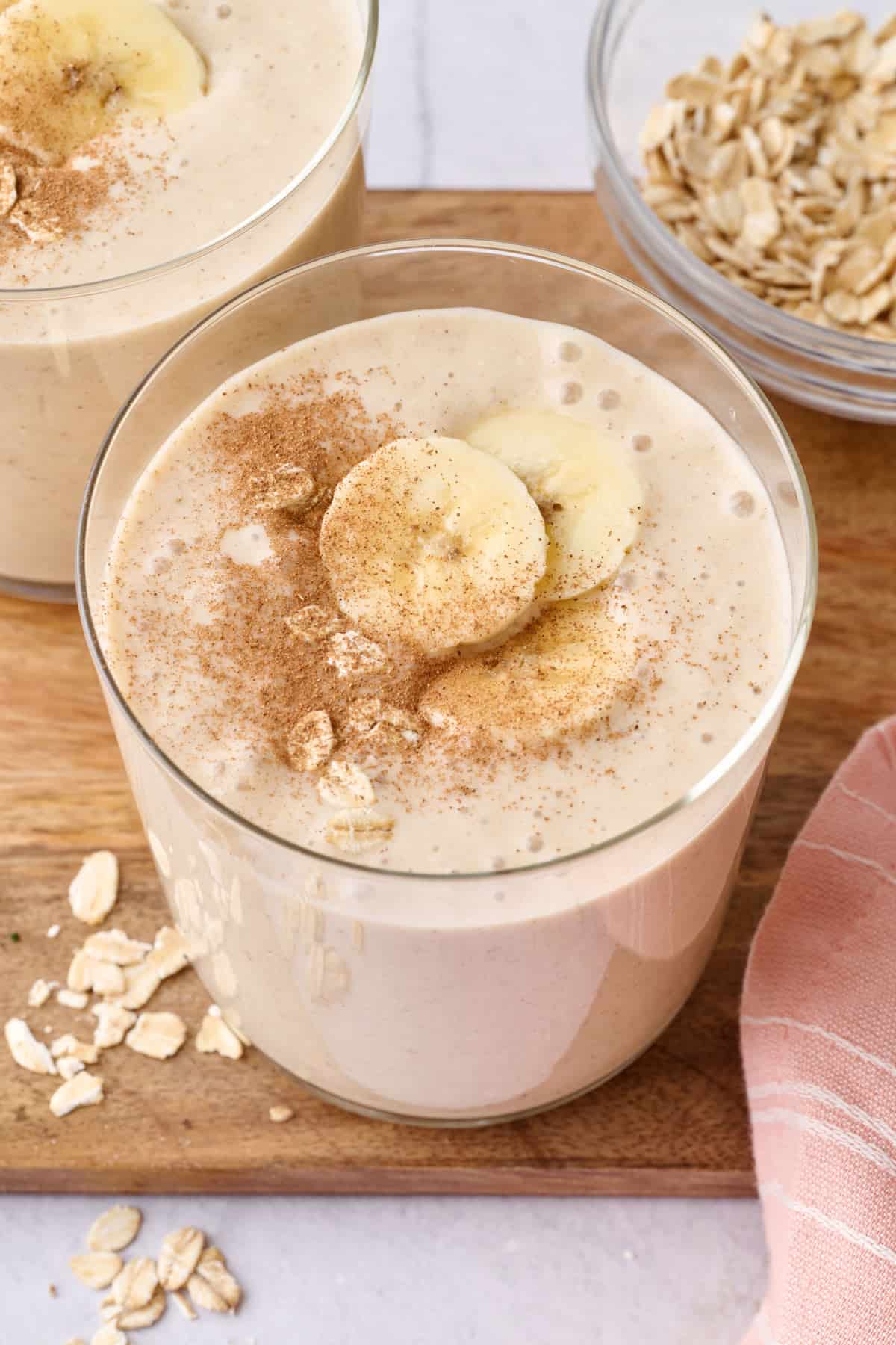 Creamy oatmeal smoothie recipe made with bananas, peanut butter, and non dairy milk.