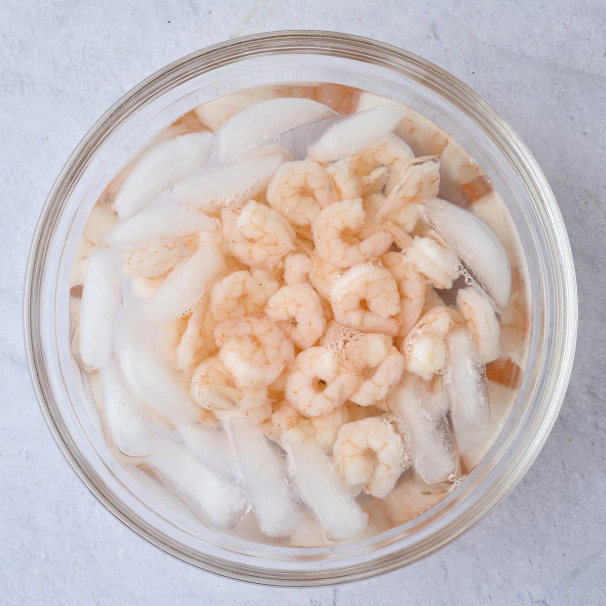 Cook shrimp in an ice water bath after cooking.