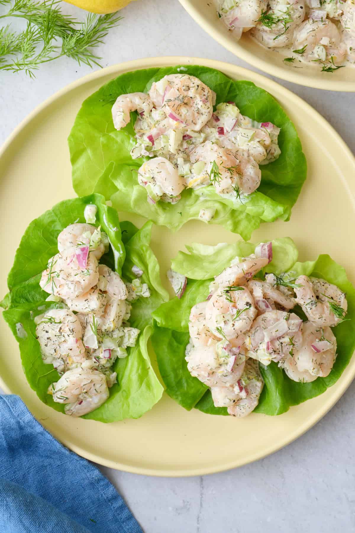 Shrimp salad with mayo served in lettuce cups.