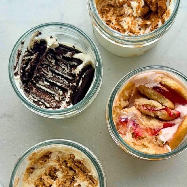 4 jars showing 2 ingredient Japanese cheesecake with different cookies, biscoff, oreo, nilla wafers, graham crackers and yogurt.
