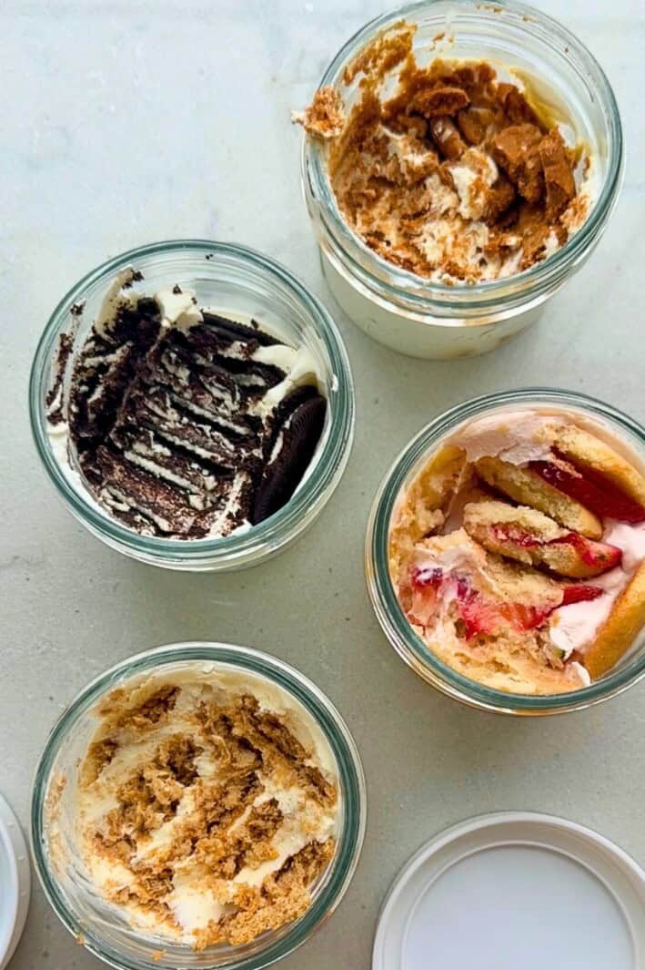 4 jars showing 2 ingredient Japanese cheesecake with different cookies, biscoff, oreo, nilla wafers, graham crackers and yogurt.