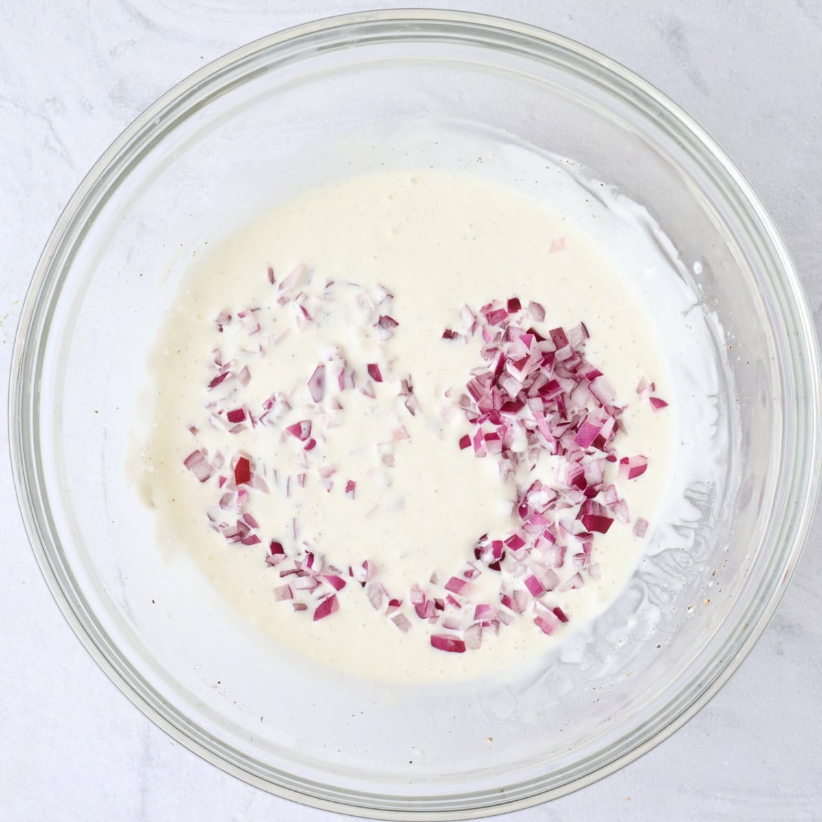 Diced red onions partially stirred in.