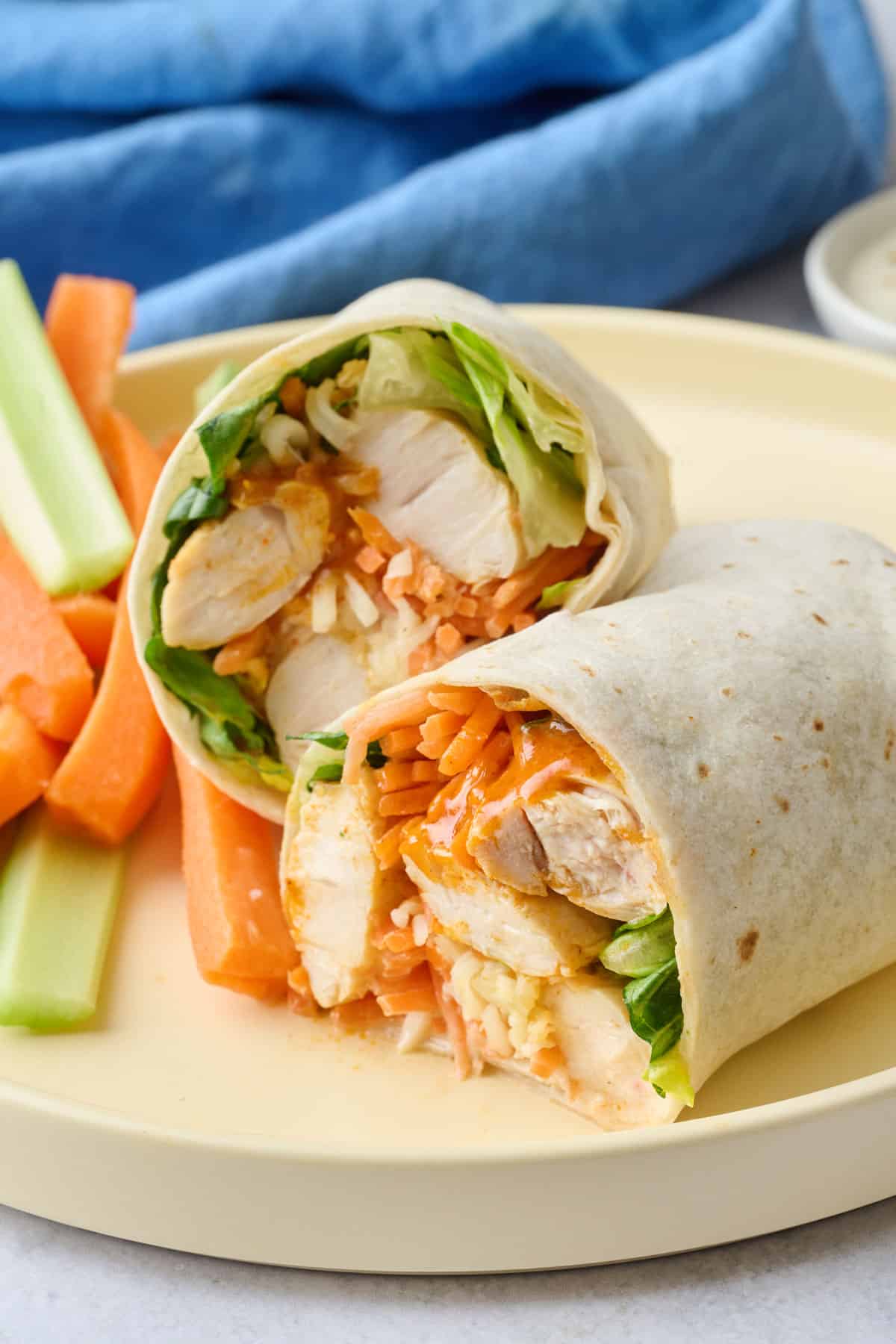 1 cut wrap on a plate with sides.