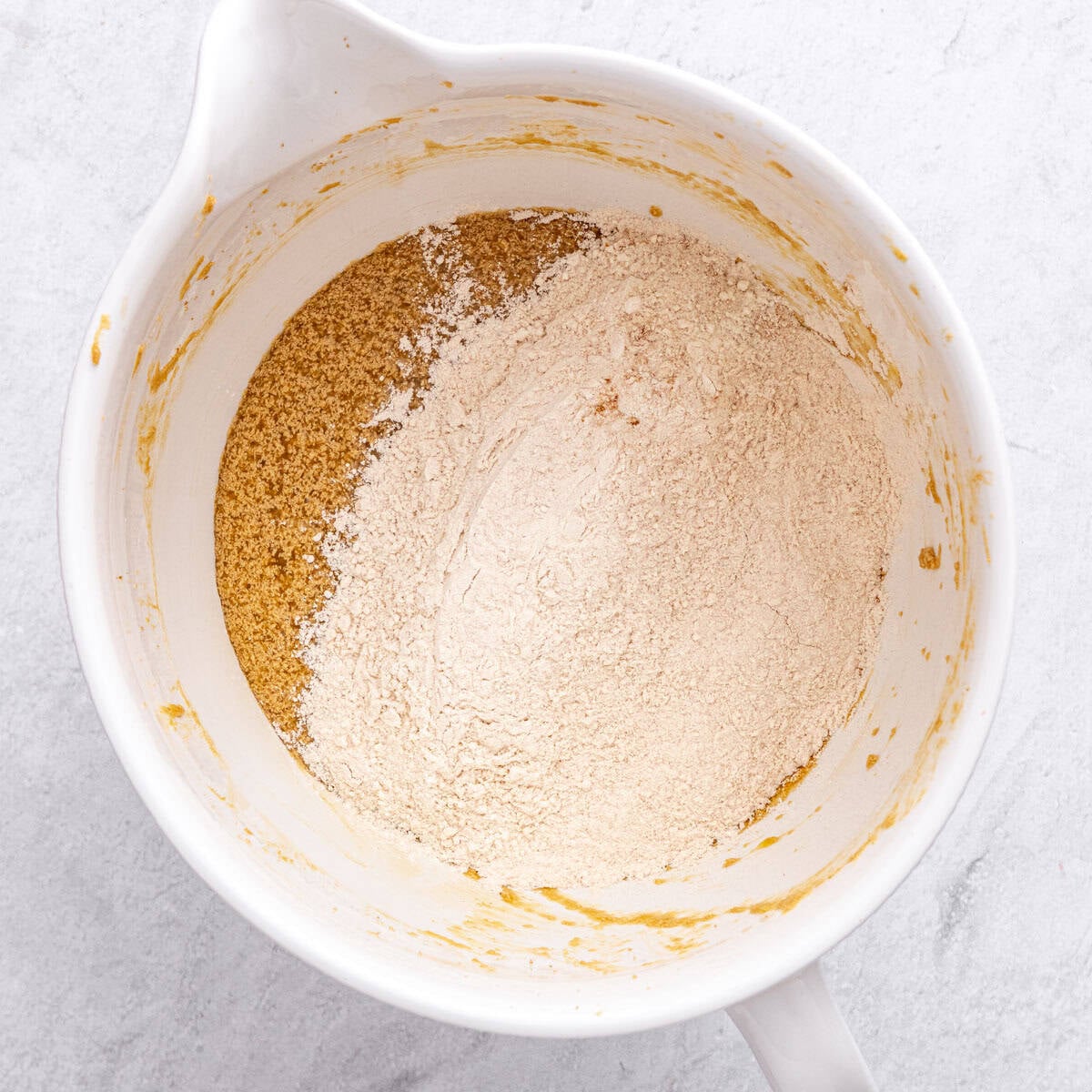 Flour added on top of wet mixture.