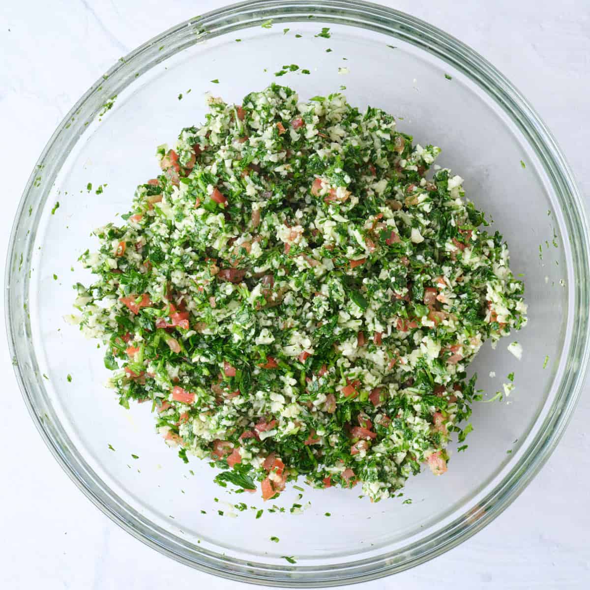After tossing tabbouleh salad in bowl.