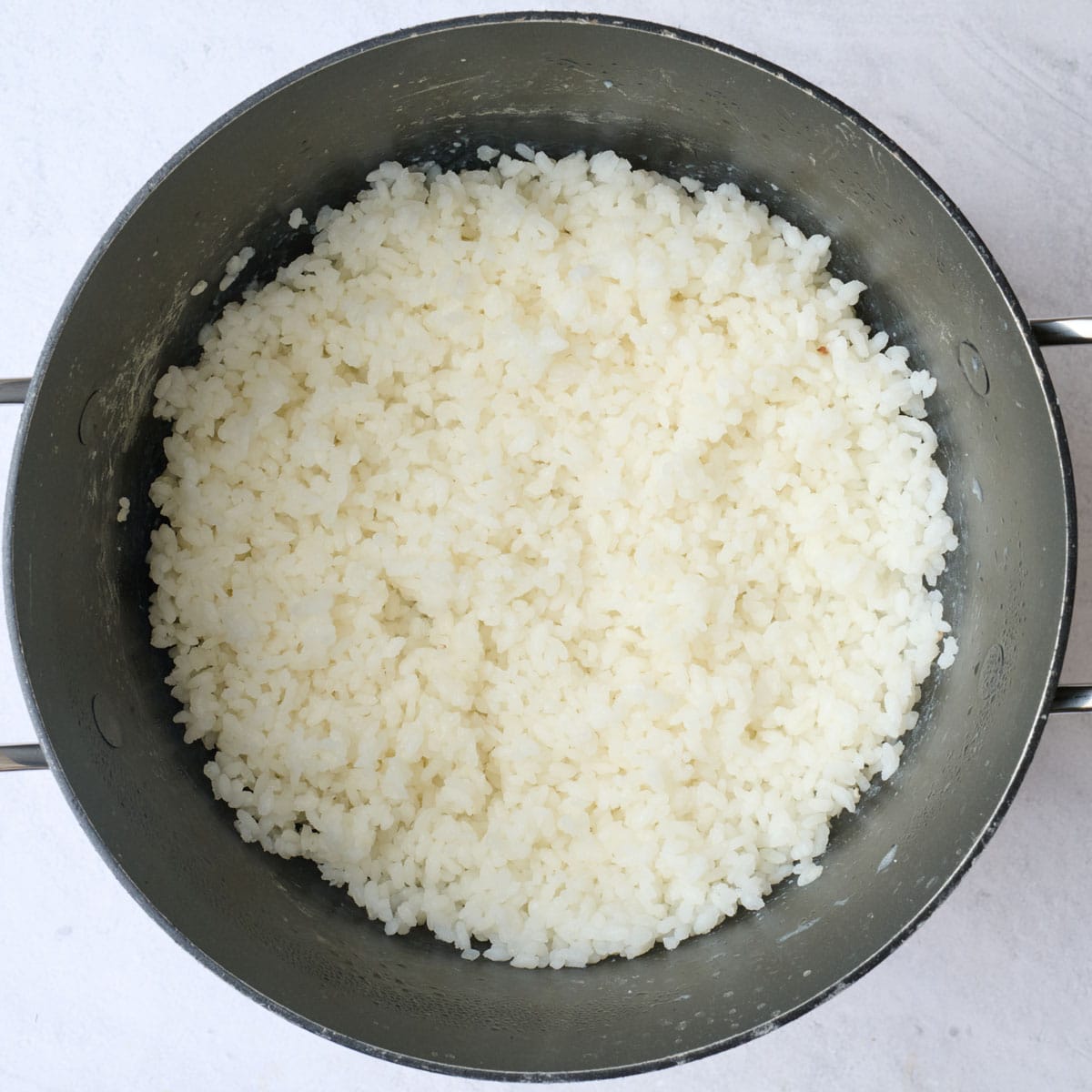 Cooked sushi rice.