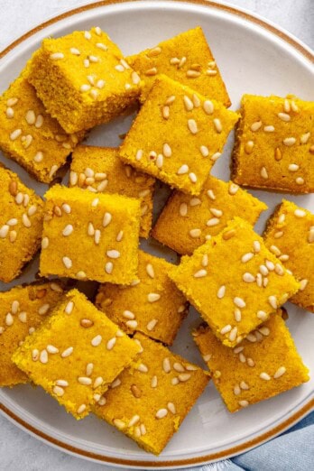 Easy turmeric cake recipe, or Lebanese sfouf recipe, on a plate.