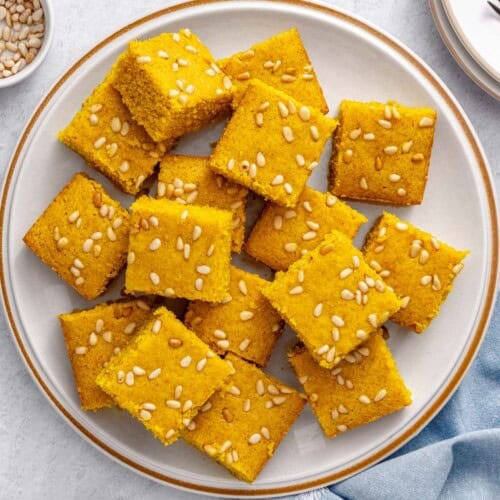 Easy turmeric cake recipe, or Lebanese sfouf recipe, on a plate.