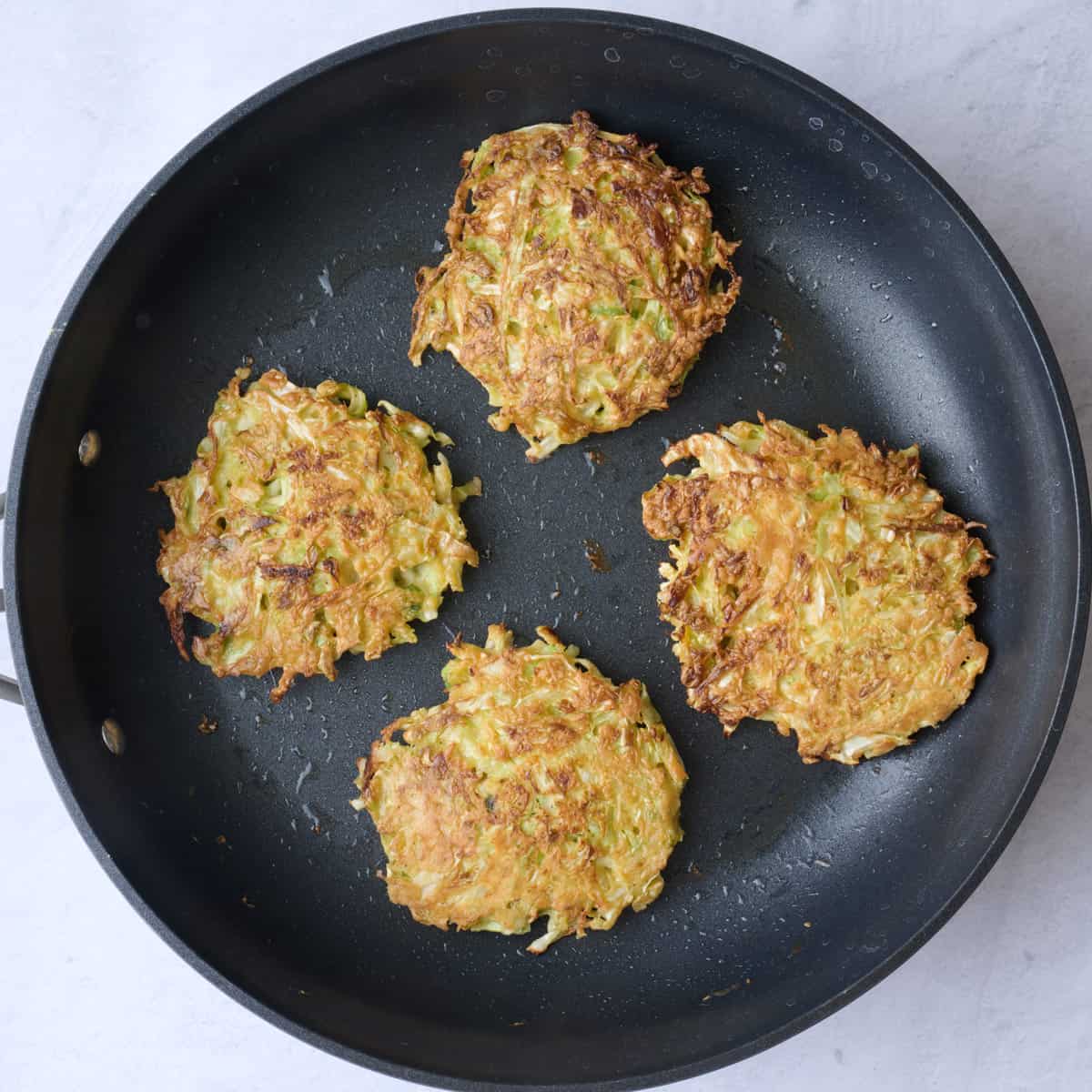 The pancakes after flipping and cooked through with golden brown crisp top