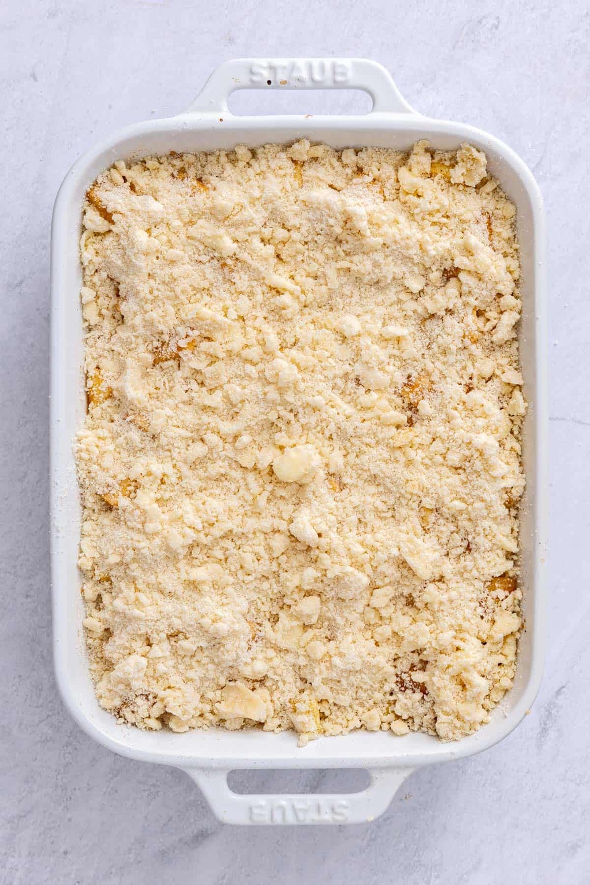 Topping sprinkled over the apples - there should be pea sized crumbles throughout.