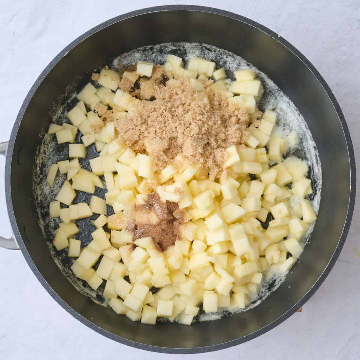 Diced apples, brown sugar, cinnamon and salt added.