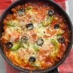 Pizza beans after baking with melty cheese.