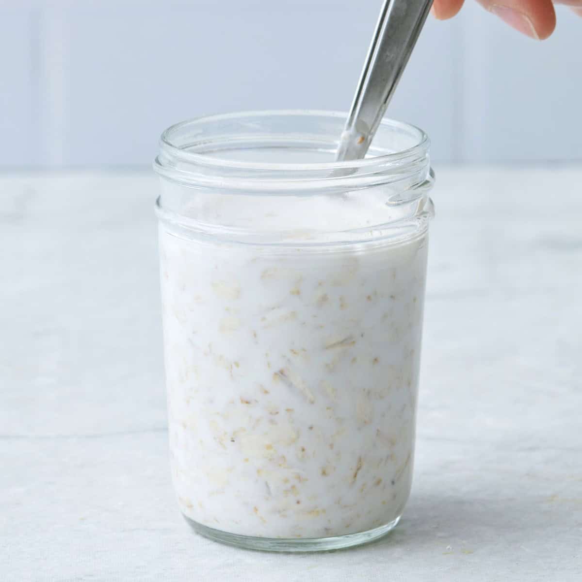 Stirring together liquid with oats.