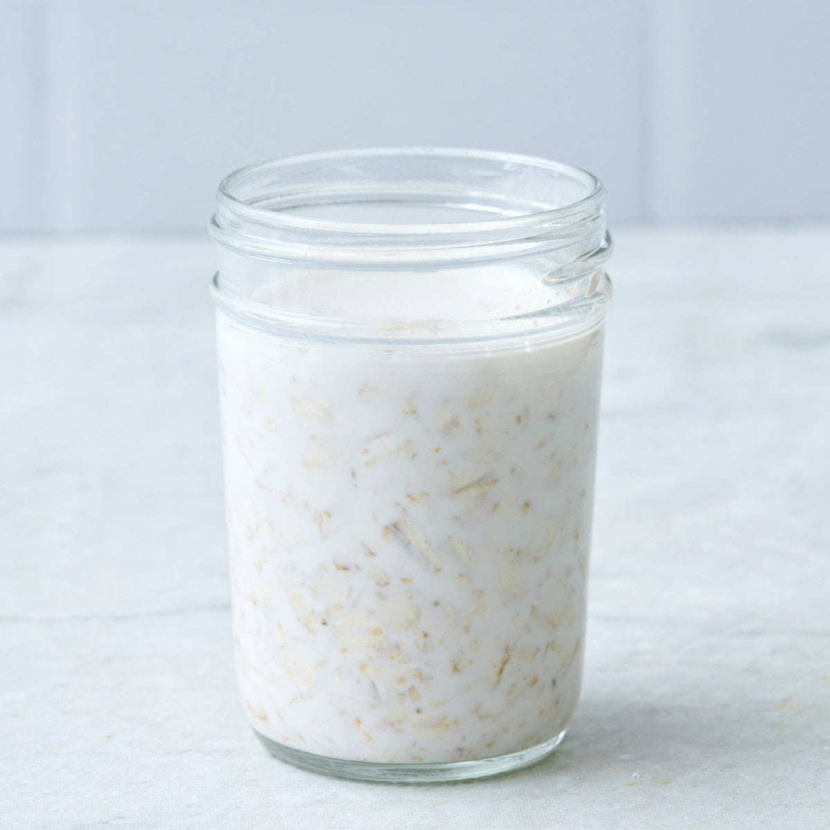 Easy overnight oats in a glass jar before storing.