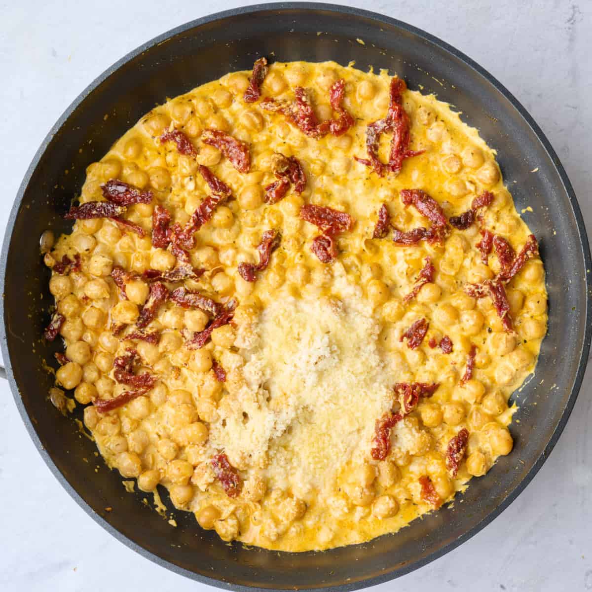 After combining with sun-dried tomatoes and parmesan cheese added.