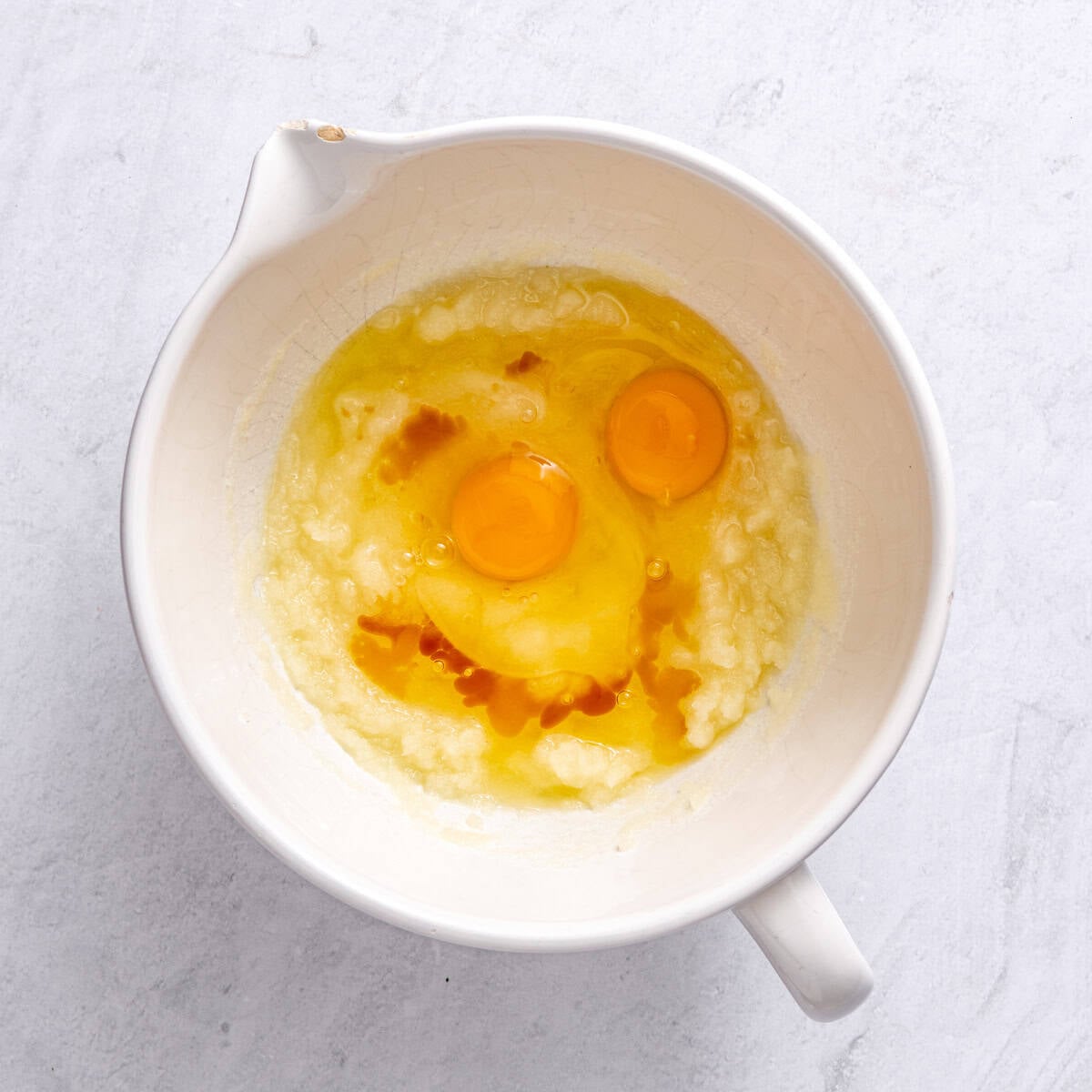 After whisking the eggssugar and oil, with eggs and vanilla added on top.