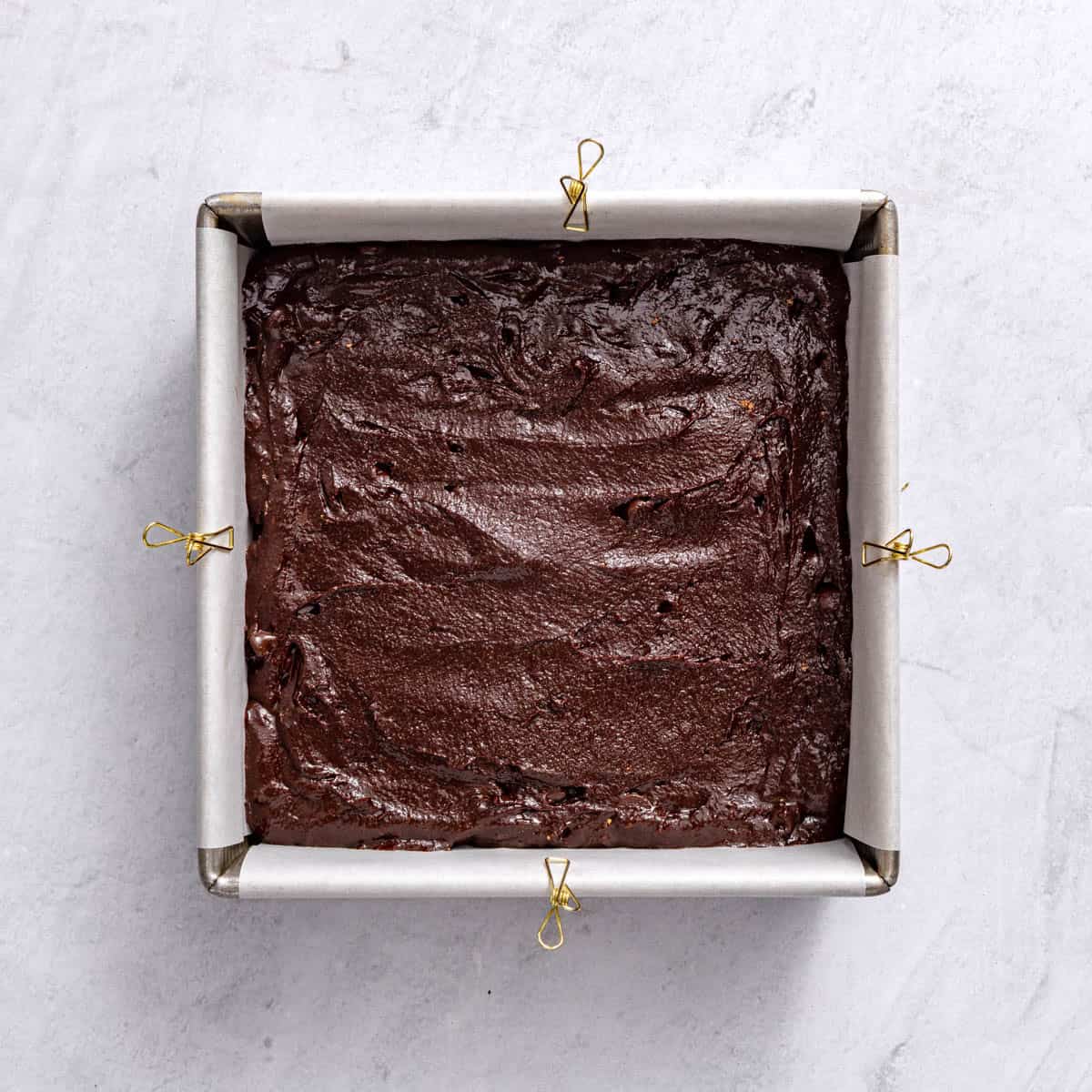 Batter added to pan before baking.
